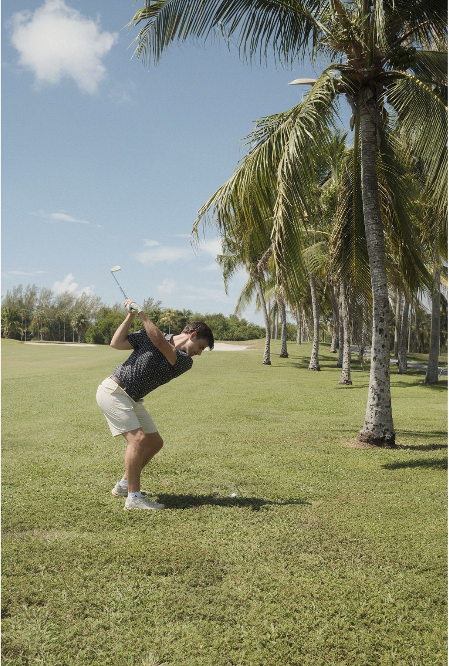 Brandon hitting an iron shot